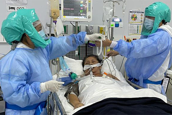 The need for personal protective equipment continues to soar across the globe. Washington University School of Medicine is donating some 300 powered air-purifying respirators developed by Jennifer DeLaney, MD ’97; Nick Colarelli, MSEE ’86; and a team of engineers and other volunteers, to international collaborators, including in Lima, Peru (pictured above). (Courtesy photo)