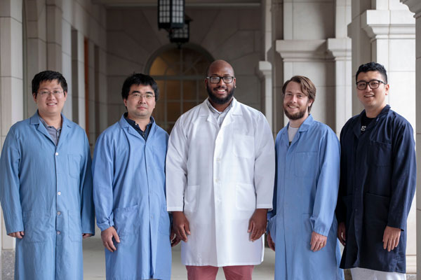 Foston, center, with members of his bioproducts engineering lab.