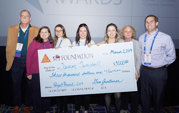 Pabjan, third from left, stands with her teammates after they've been presented with their prize at the Project Precast Design Competition.